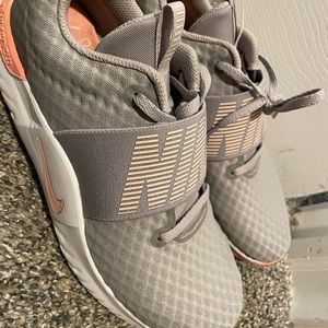 Peach and gray Nike shoes